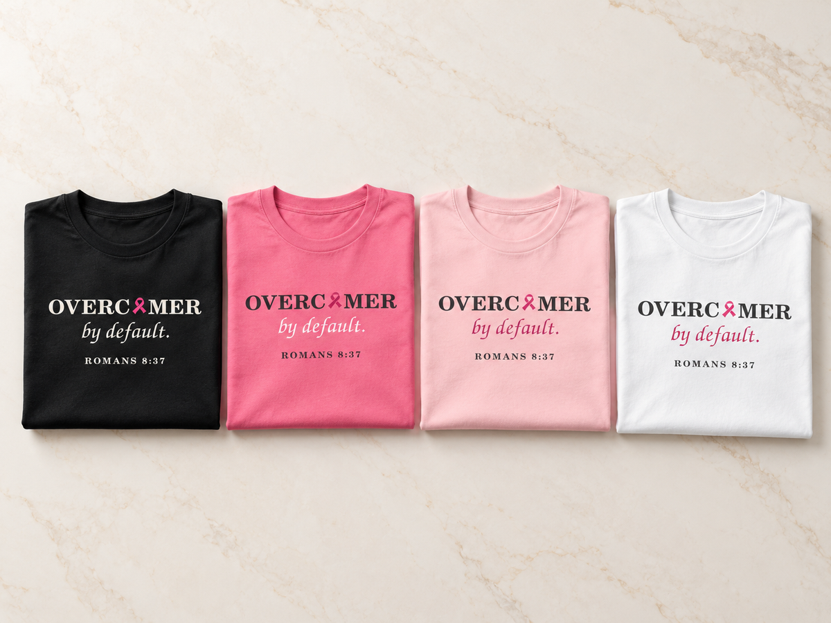 Press & Amen | Overcomer by Default | Breast Cancer Awareness Women’s Premium Tee